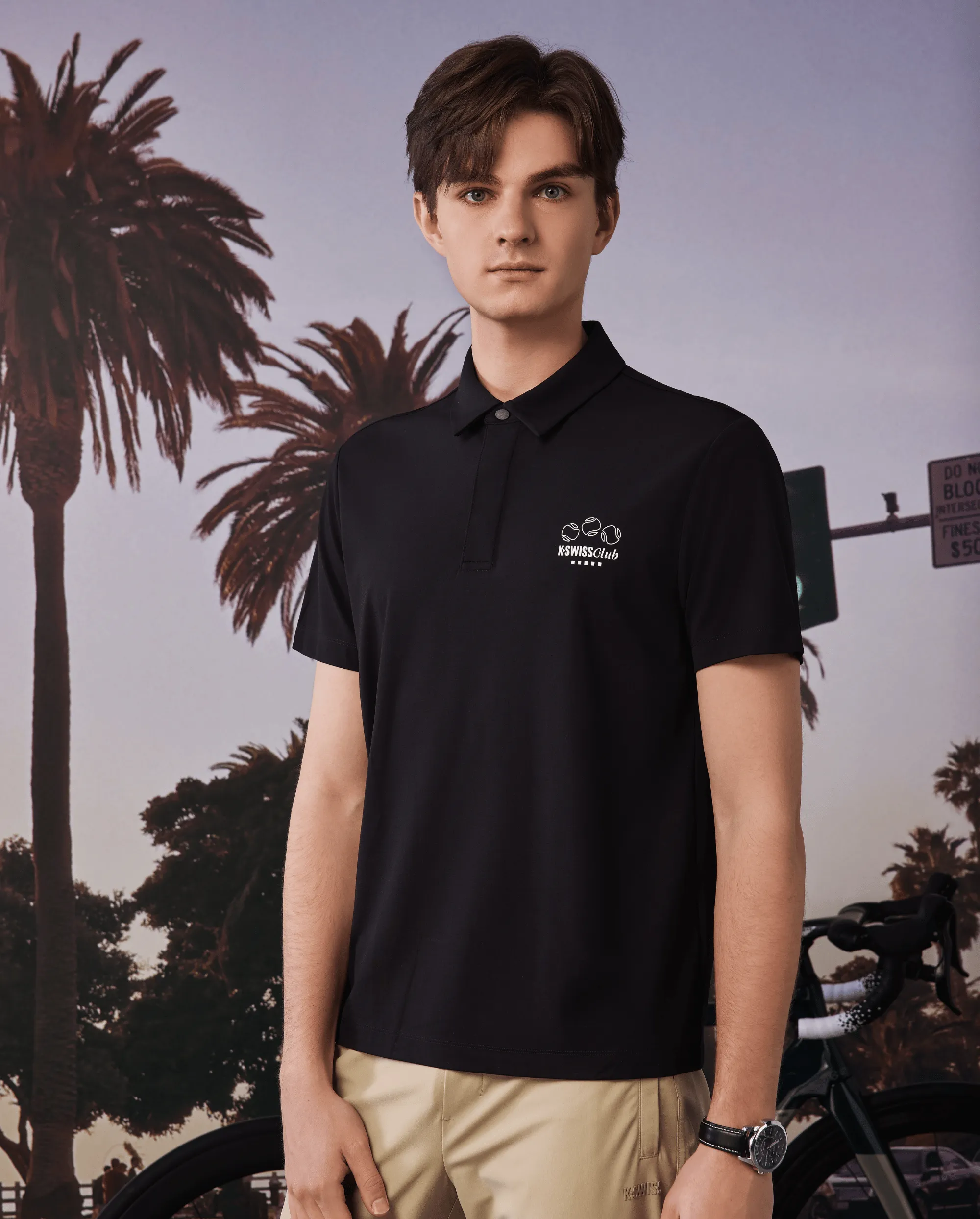 109877-008 | MEN'S K-SWISS TENNIS CLUB LOGO POLO SHIRT | BLACK